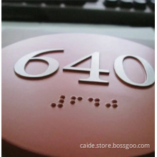 Braille under ADA auditorium number